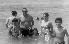 Fig. 5bEnzo's family at the seaside with the group.