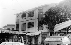 Fig. 1b Typical building with �burglar-proof� grilles.