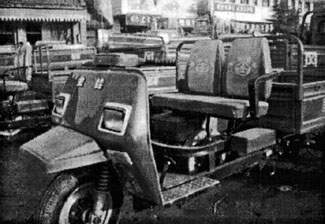 Fig. 1Site of water tank under seat. The tank is the reservoir for engine coolant.
