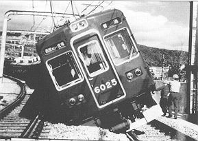Fig. 7 - Derailed Kankyu line train.